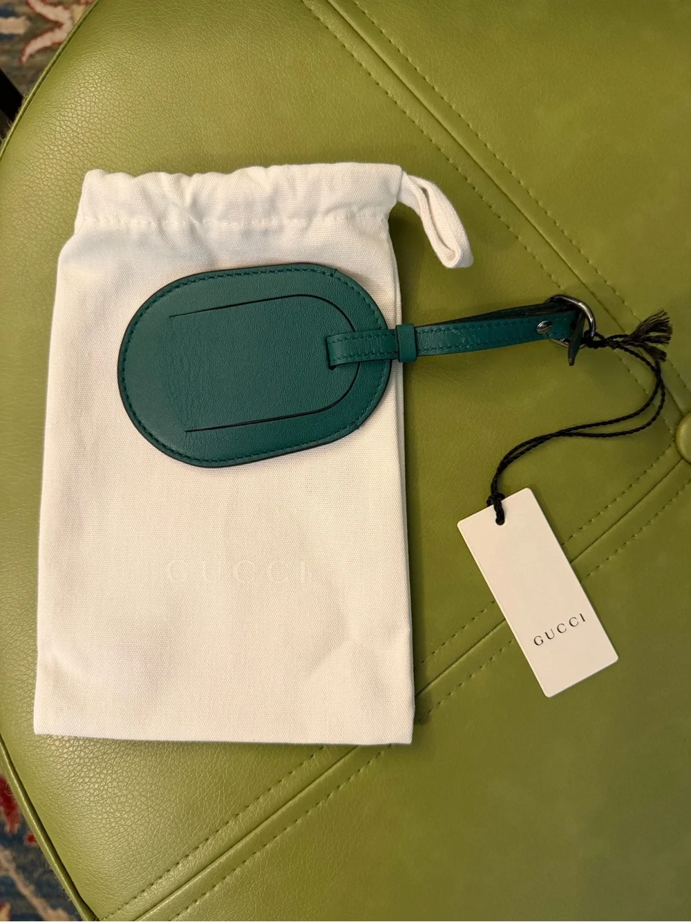 NWT Gucci Oval Leather Luggage Tag with Embossed Logo